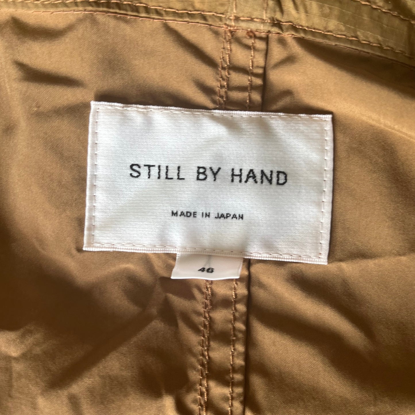 Manteau à capuche déperlant