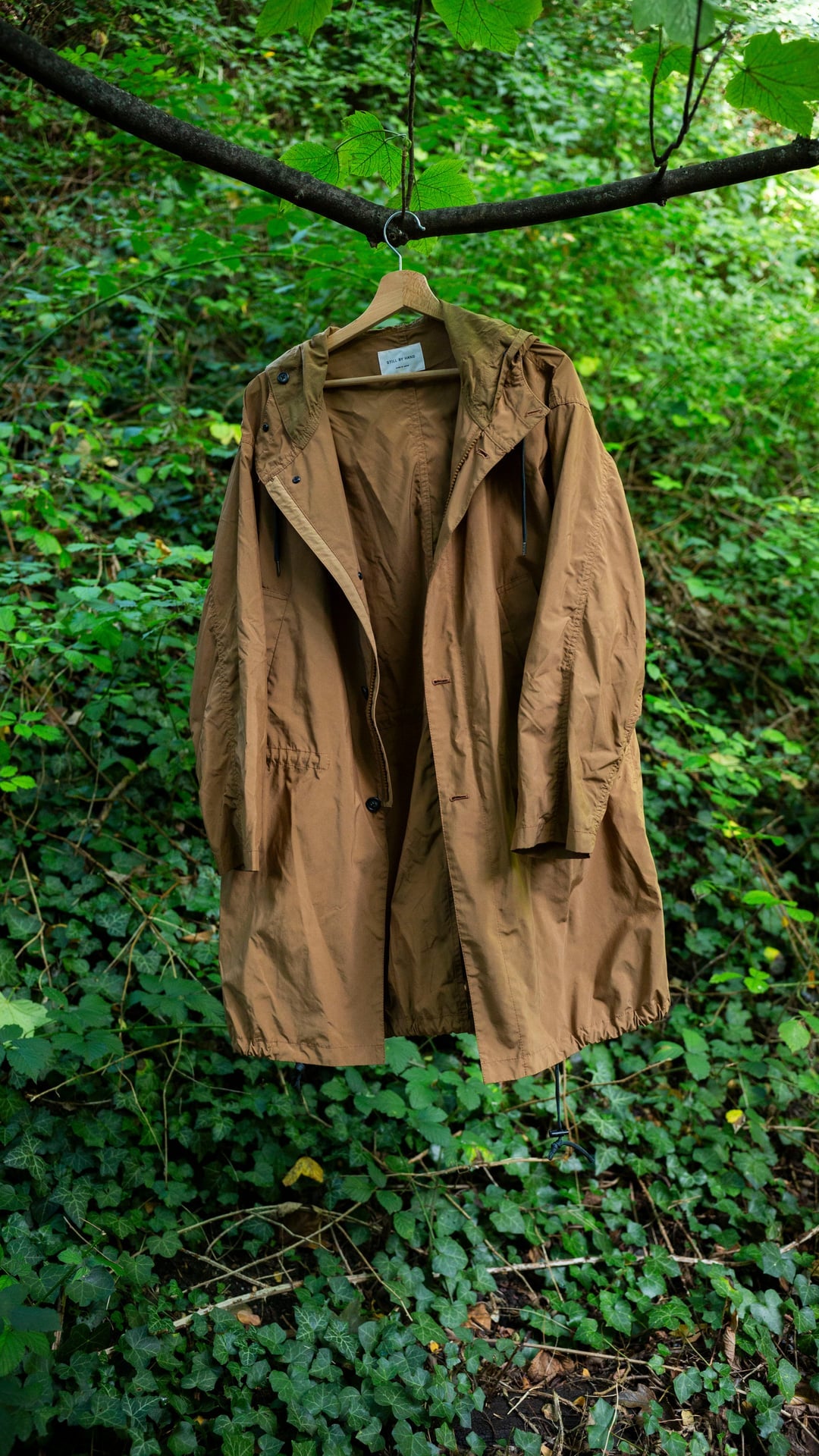 Manteau à capuche déperlant