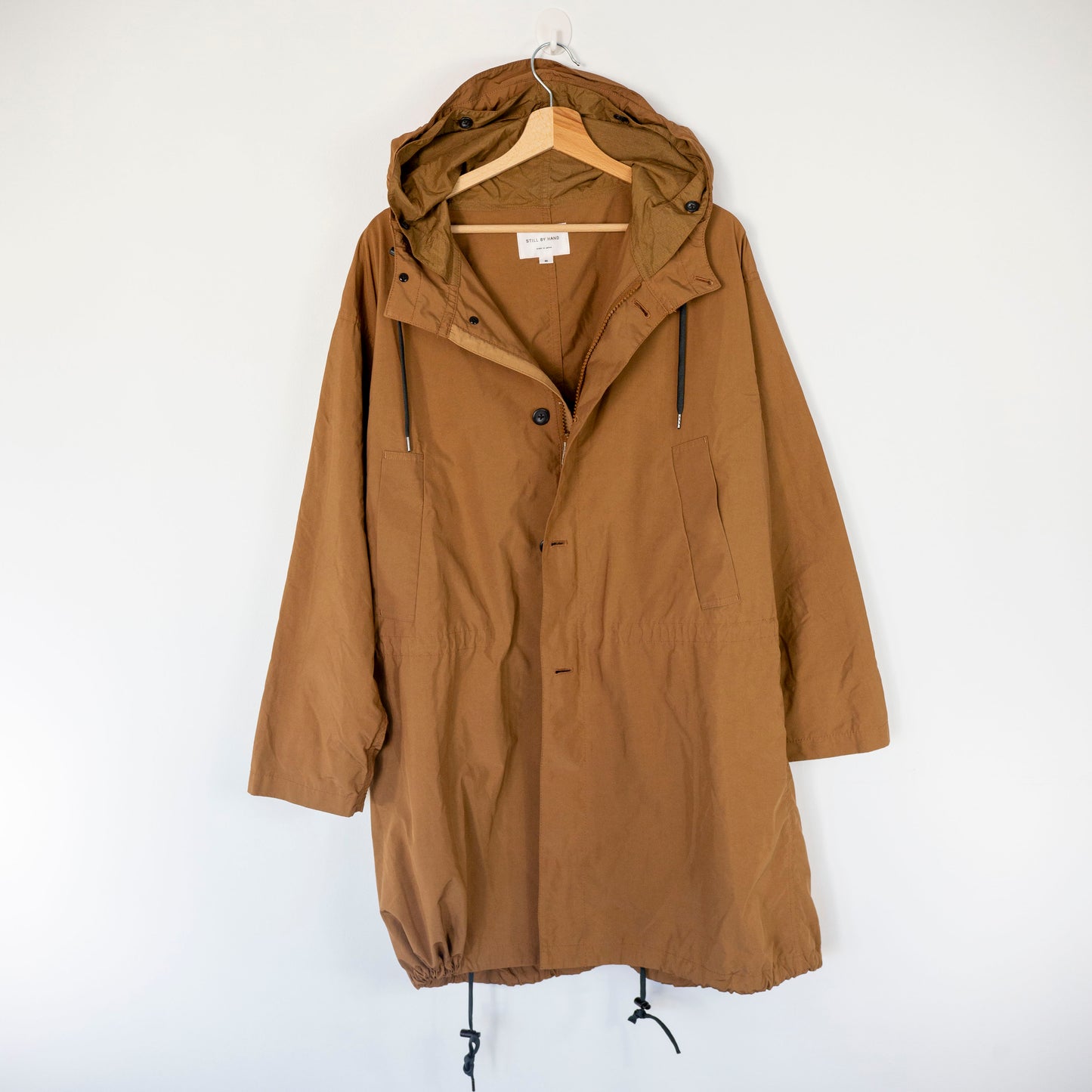 Manteau à capuche déperlant