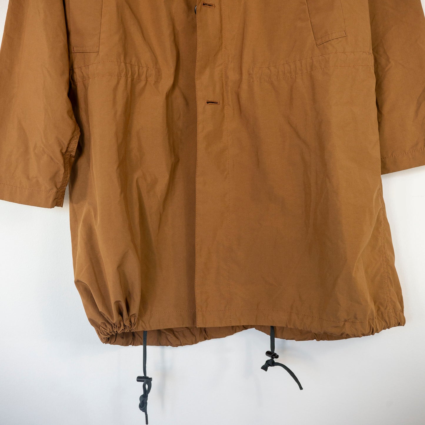 Manteau à capuche déperlant